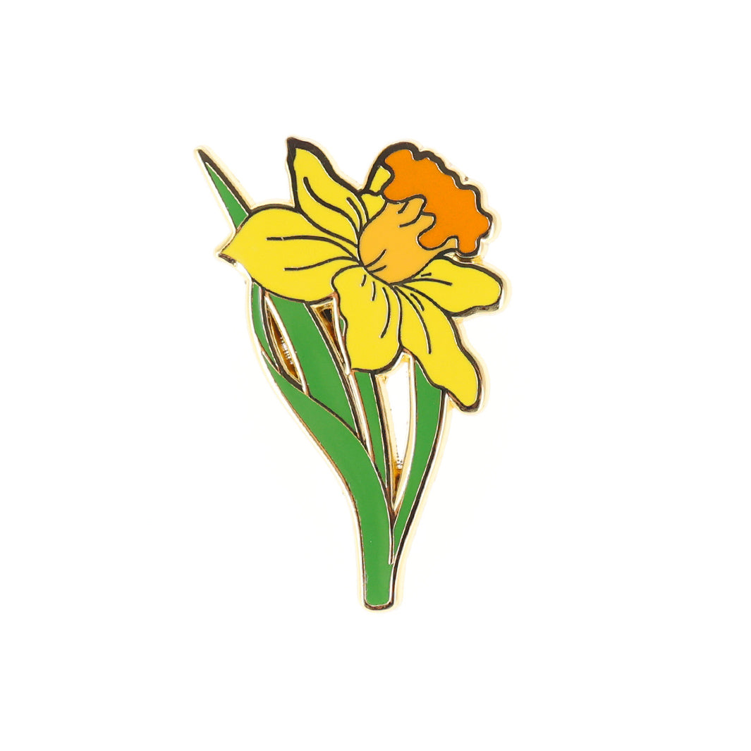 photo packshot du pin's en forme de fleurs de jonquille jaune, orange et verte