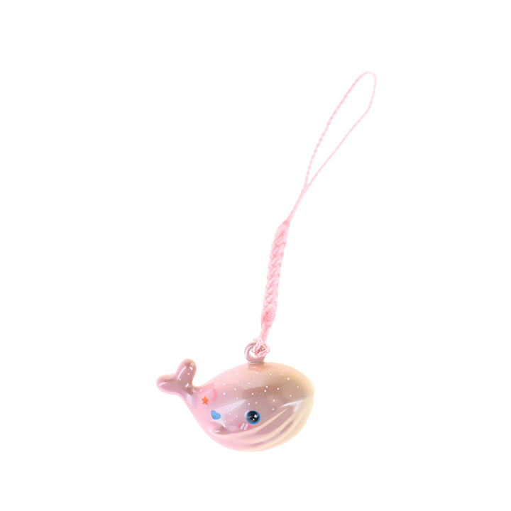 photo packshot d'un porte-clefs en forme de baleine de couleur rose et jaune nacré