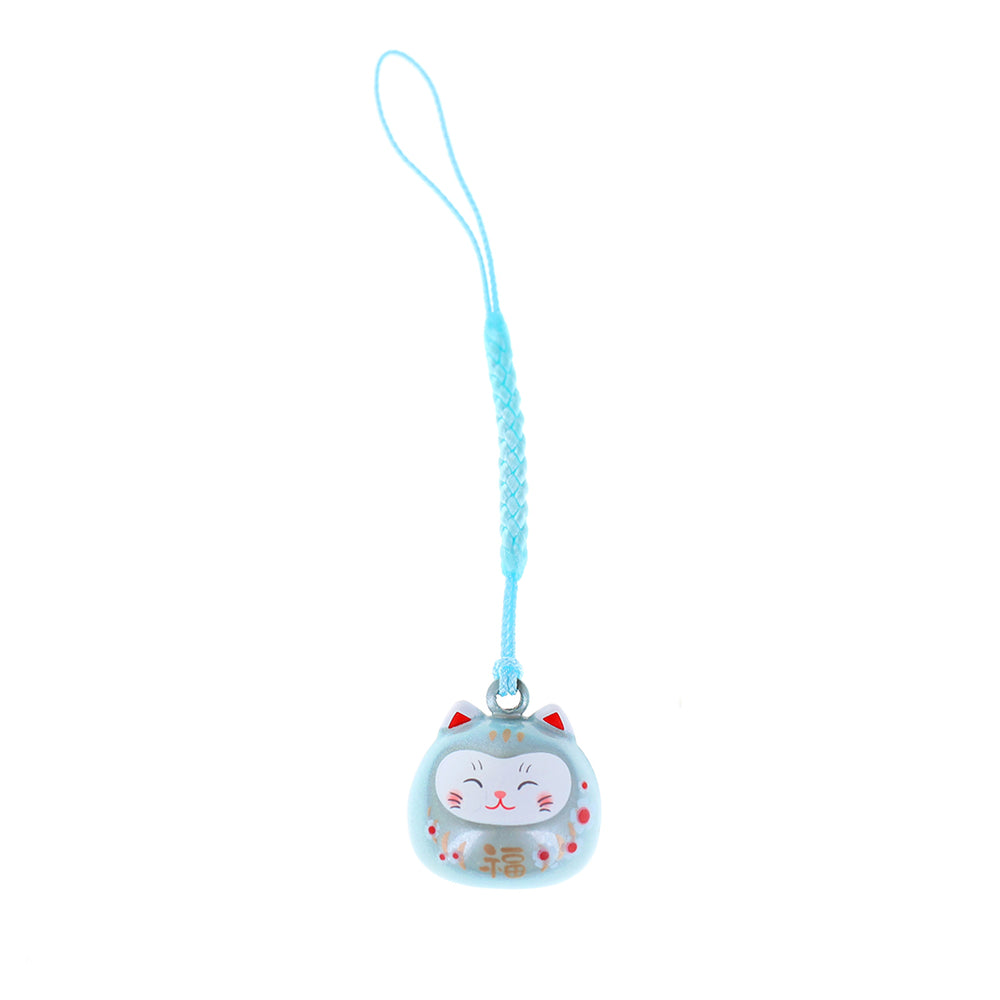 photo packshot d'un porte-clefs en forme de daruma et de chat de couleur bleu ciel nacré