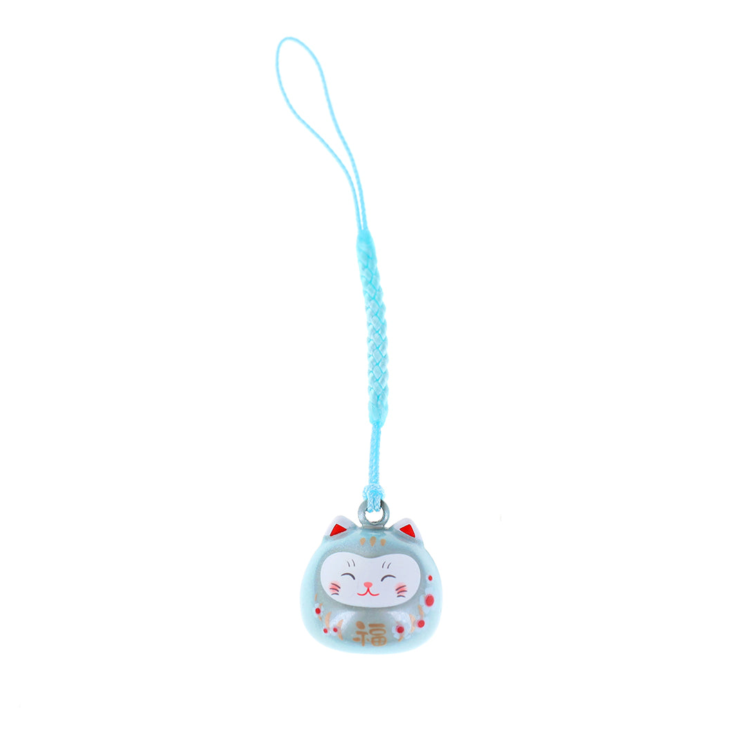 photo packshot d'un porte-clefs en forme de daruma et de chat de couleur bleu ciel nacré
