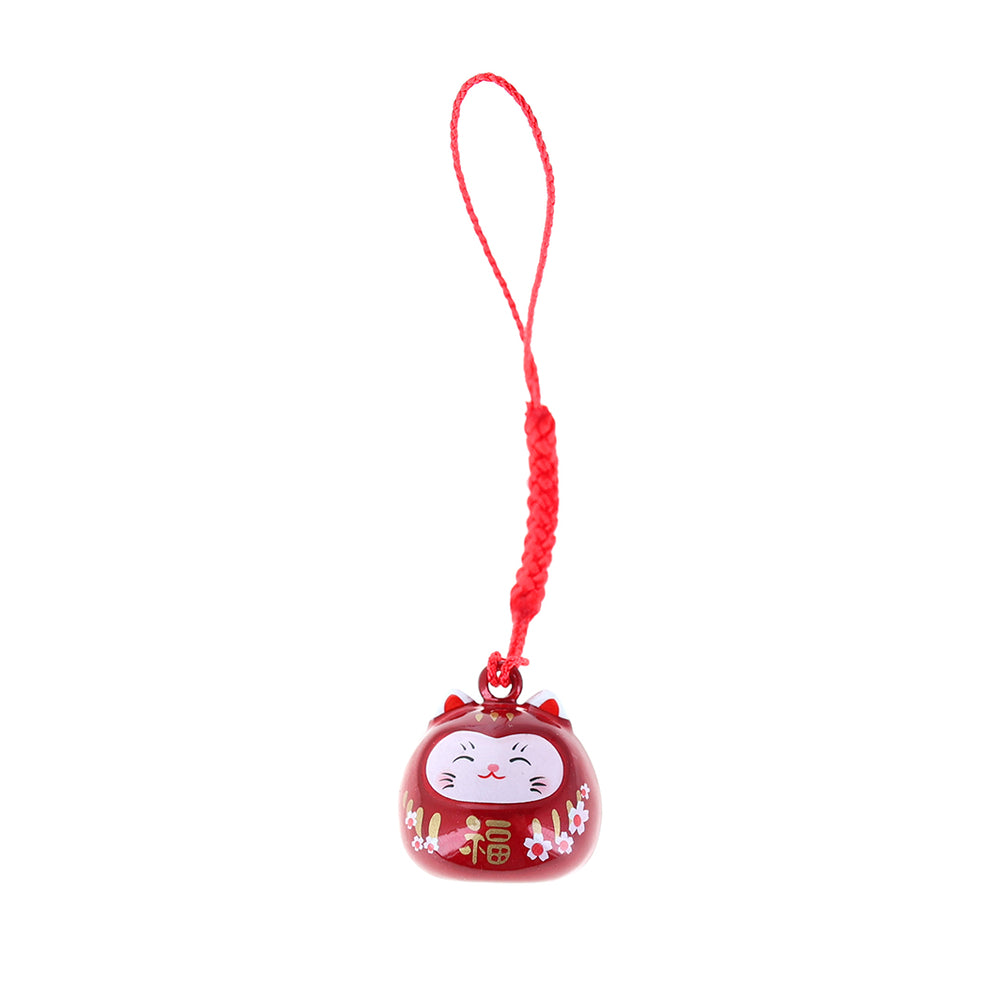 photo packshot d'un porte-clefs en forme de daruma et de chat de couleur rouge nacré