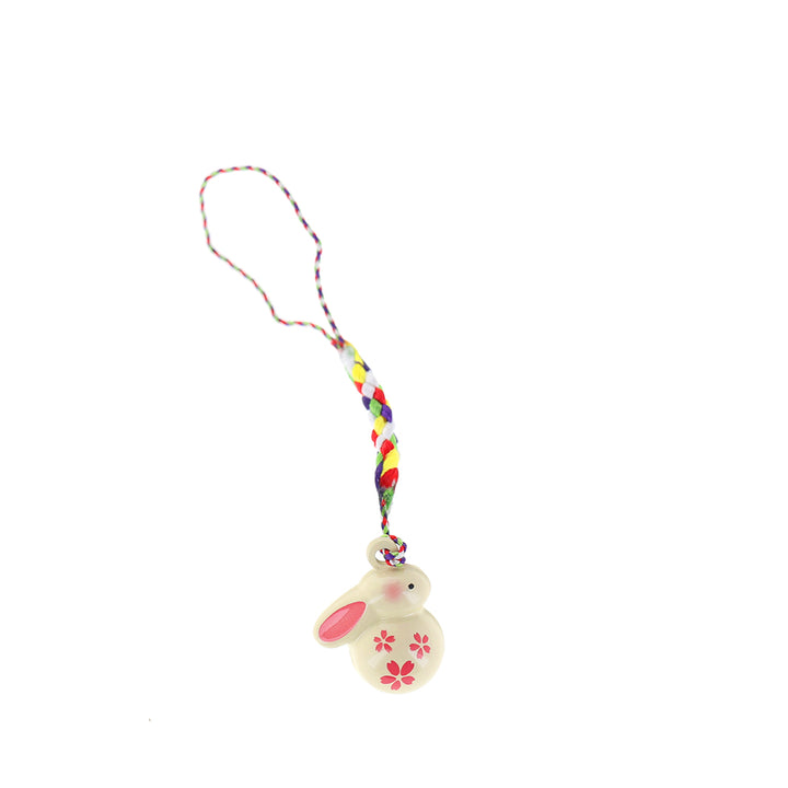 photo packshot d'un porte-clefs en forme de lapin de couleur jaune et rose