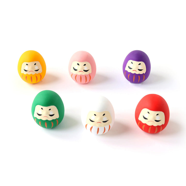 photo packshot de la sélection de daruma en céramique jaune, rose, violet, vert, blanc et rouge