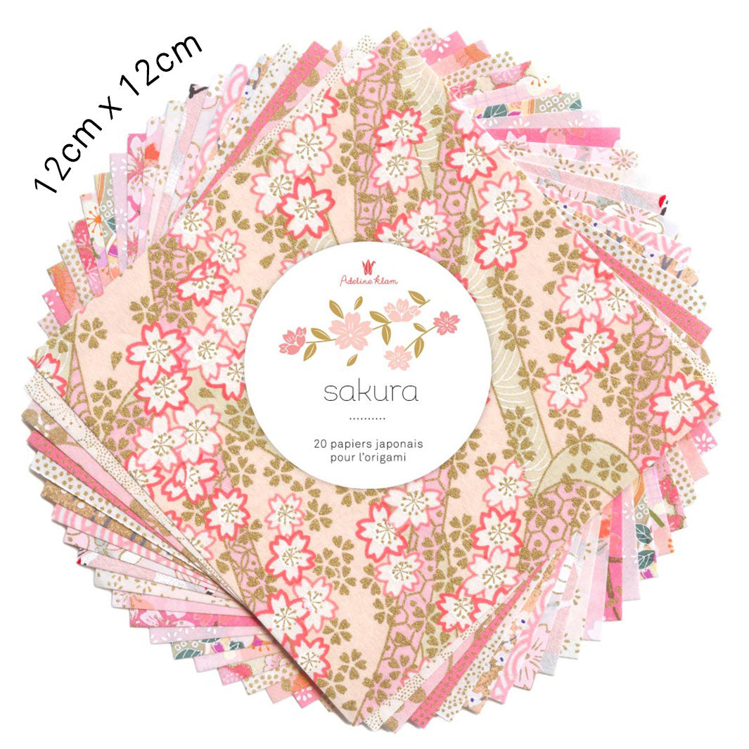 photo packshot du set de 7 carrés de papiers japonais adeline klam de 12cm par 12cm dans les tons rose clair et pâle, corail, blancs, crème et dorés « sakura »