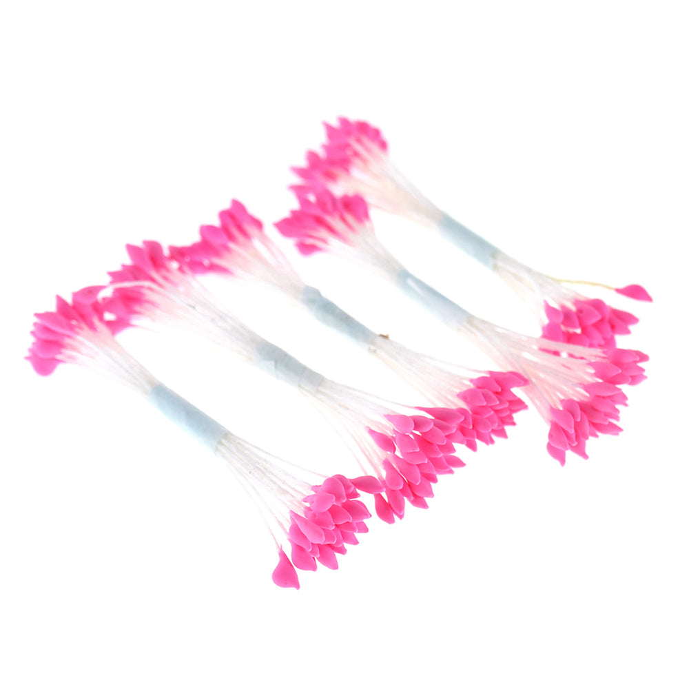 photo packshot vue de biais du lot de 5 fagots de pistils de fleurs rose fluo et blancs (187)