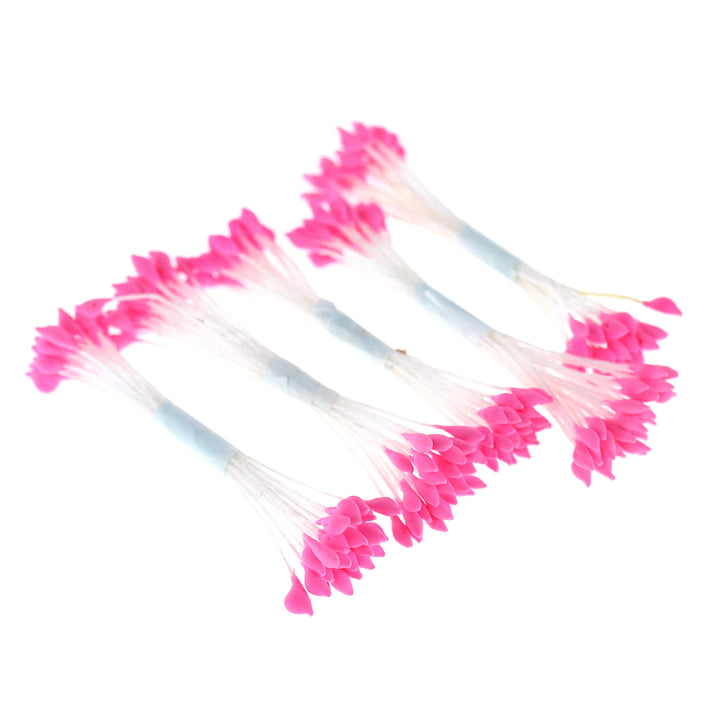photo packshot vue de biais du lot de 5 fagots de pistils de fleurs rose fluo et blancs (187)