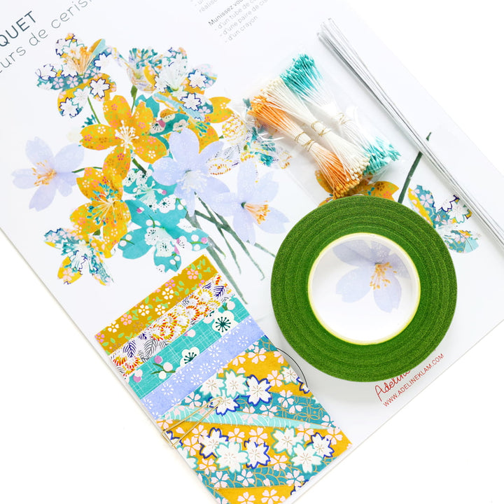 photo packshot zoomée du packaging du kit fleurs de cerisier bleu lavande, jaune moutarde et bleu turquoise « multifruits » adeline klam