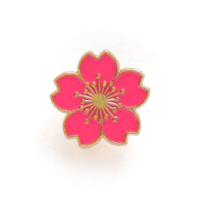 pin's en forme de fleur de cerisier rose fluo