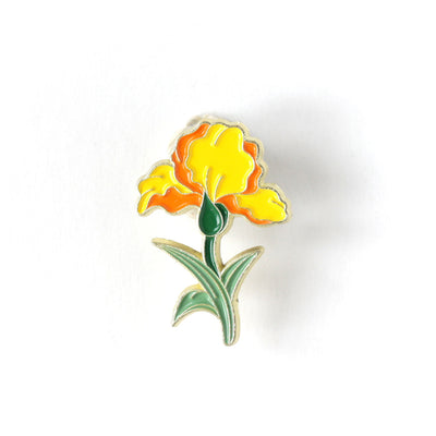 pin's en forme d'iris dans les tons jaunes et orange