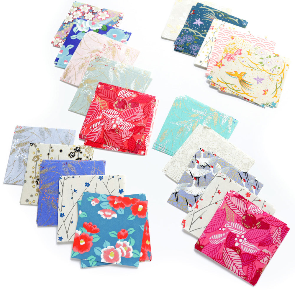 sélection de papiers du set de 100 papiers origami en 6cm par 6cm « boréal » aux motifs et tons variés