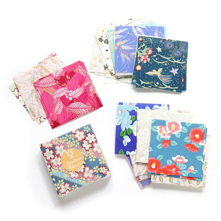 sélection de papiers du set de 100 papiers origami en 6cm par 6cm « boréal » aux motifs et tons variés