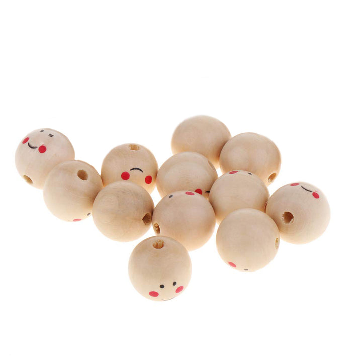 Lot de 12 perles en bois aux visages souriants