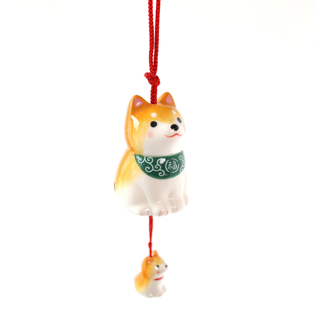 clochette à vent japonaise en céramique orange et verte en forme de chien shiba inu suspendue