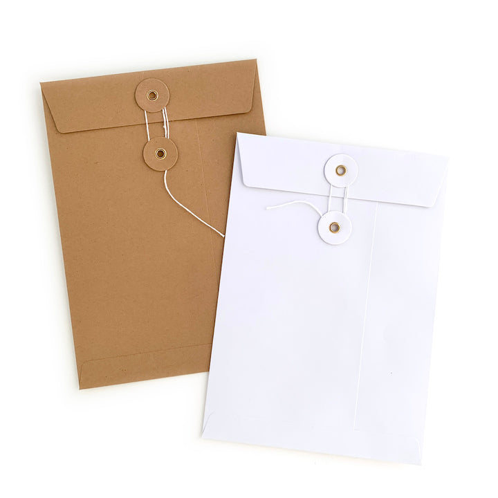 enveloppes japonaises blanche et kraft à fermeture à rondelle et ficelle de 23cm par 16cm blanc