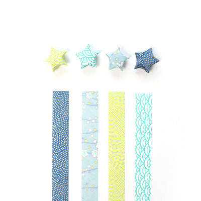 kit d'étoiles en origami et papier japonais bleu, turquoise et jaune acidulé « myosotis » adeline klam posé à plat droit