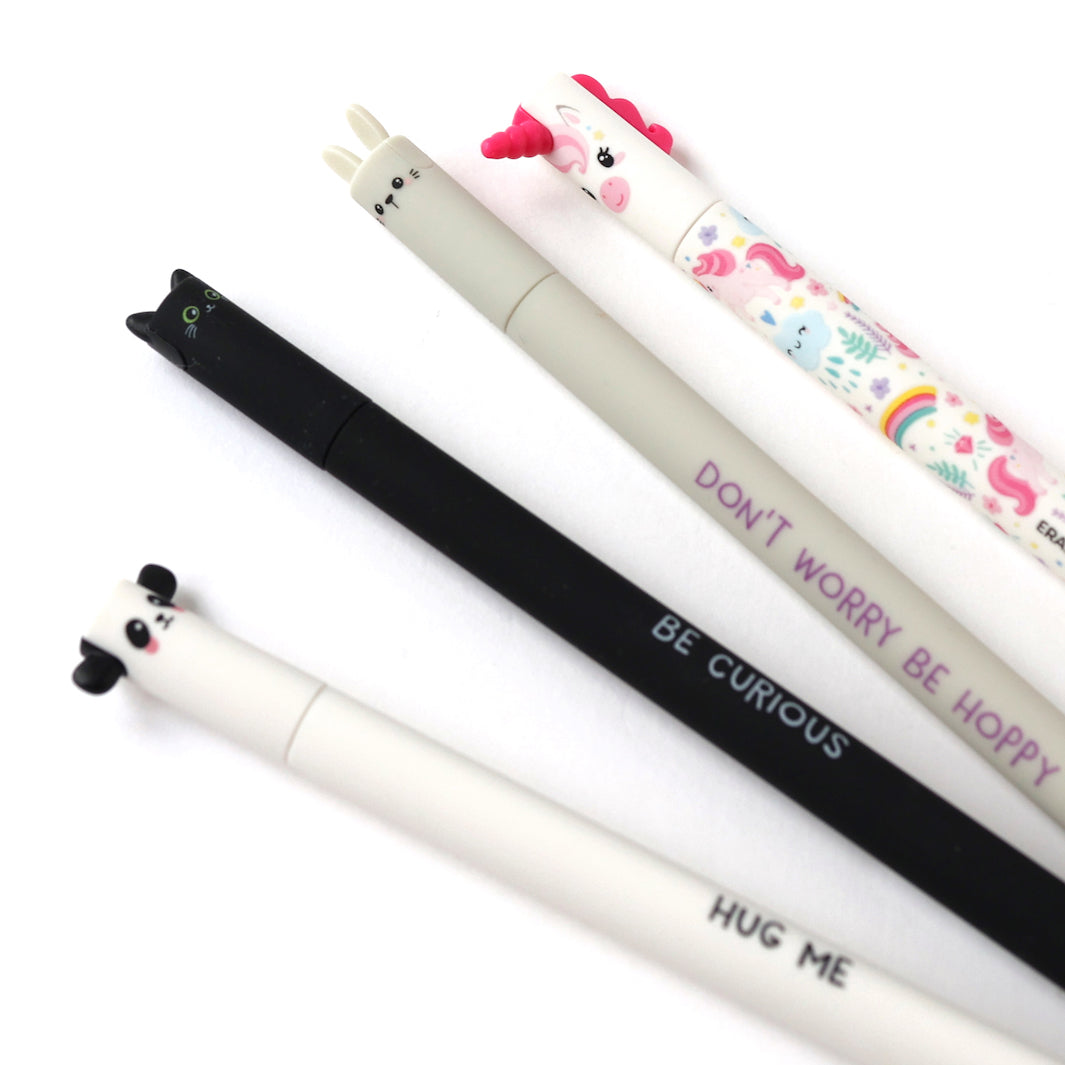 zoom de stylos gel effaçables aux capuchons en forme de tête de panda noir et blanc, de chat noir, de lapin beige et de licorne multicolore