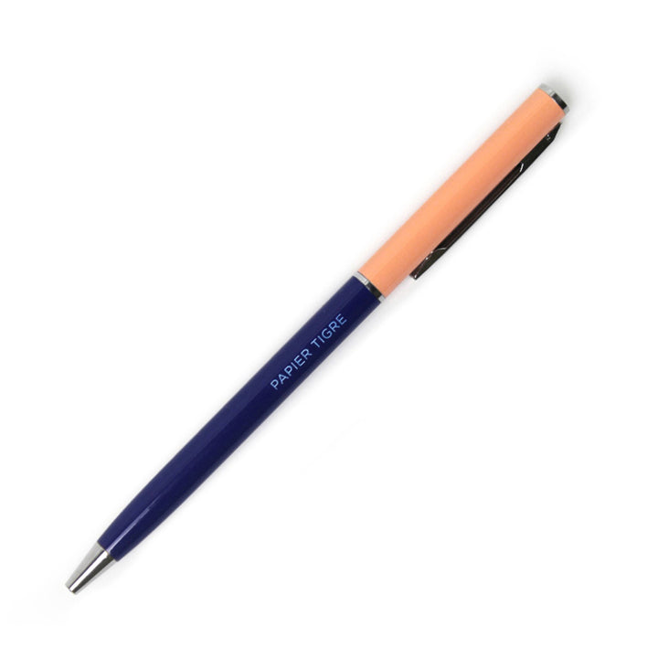 stylo bille bicolore bleu marine et orange saumon pointe 0,7mm et encre noire papier tigre